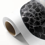 Abstract geometric rolled canvas art showcasing vibrant colors and intricate shapes, elegantly packaged in a protective cardboard tube, perfect for modern decor.