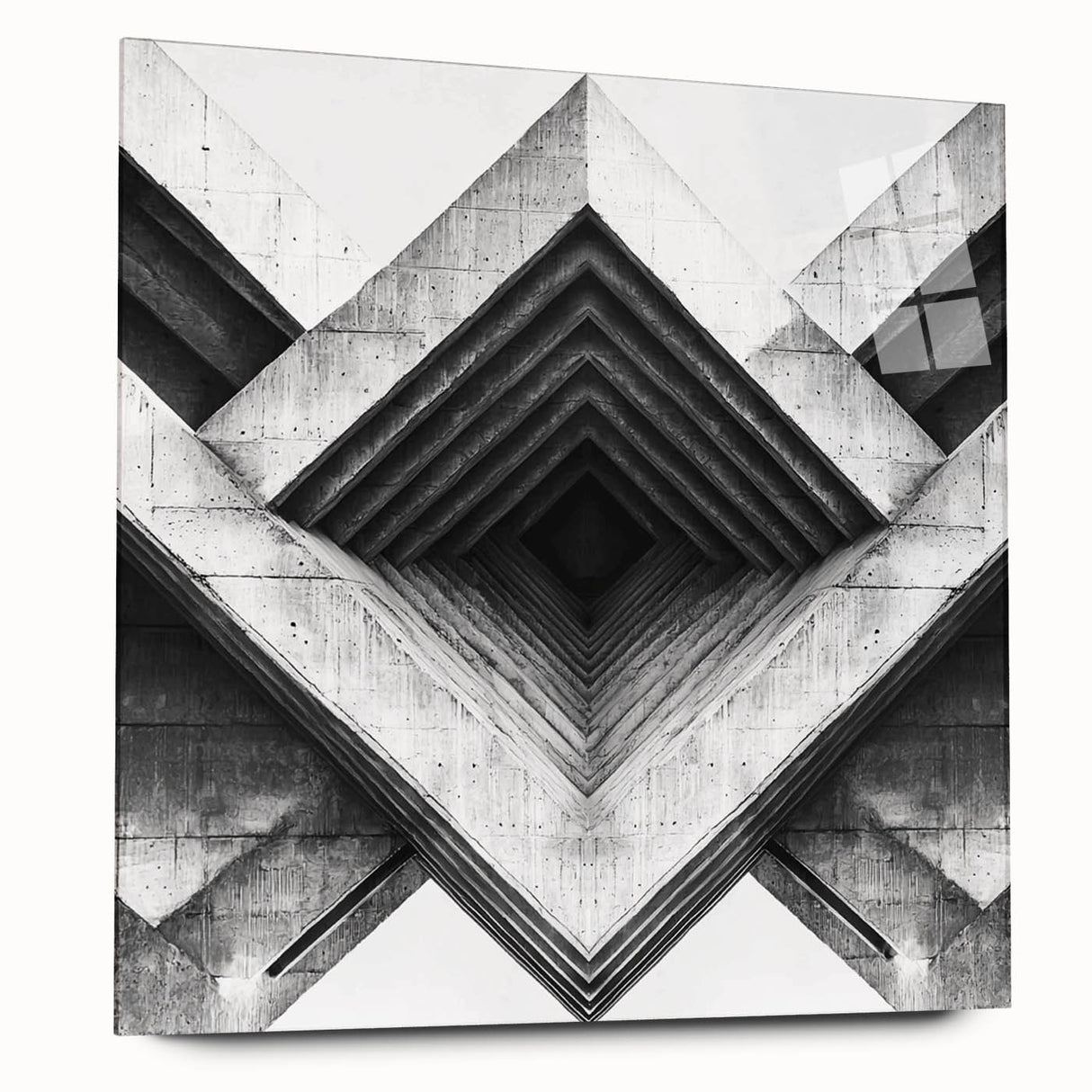 Large abstract wall art on acrylic glass depicting geometric shapes in muted gray and blue tones.