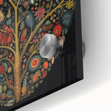 Close-up of vibrant acrylic wall art featuring colorful flowers and botanical leaves on a sleek glass surface, perfect for home decor enhancement.