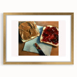 Extra large abstract art print of pastries in muted earth tones, framed in gold, ideal for living room decor.