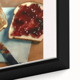 Close-up of black wall art featuring colorful pastries, textured surface on a framed canvas, suitable for living room decor.