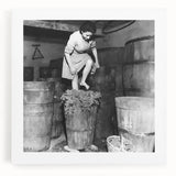 Large black and white stretched canvas depicting a bustling market scene, suitable for kitchen wall art.