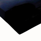 Close-up of a stretched canvas showcasing vibrant African tribal wall art with intricate patterns and rich colors, ideal for home decor and cultural expression.