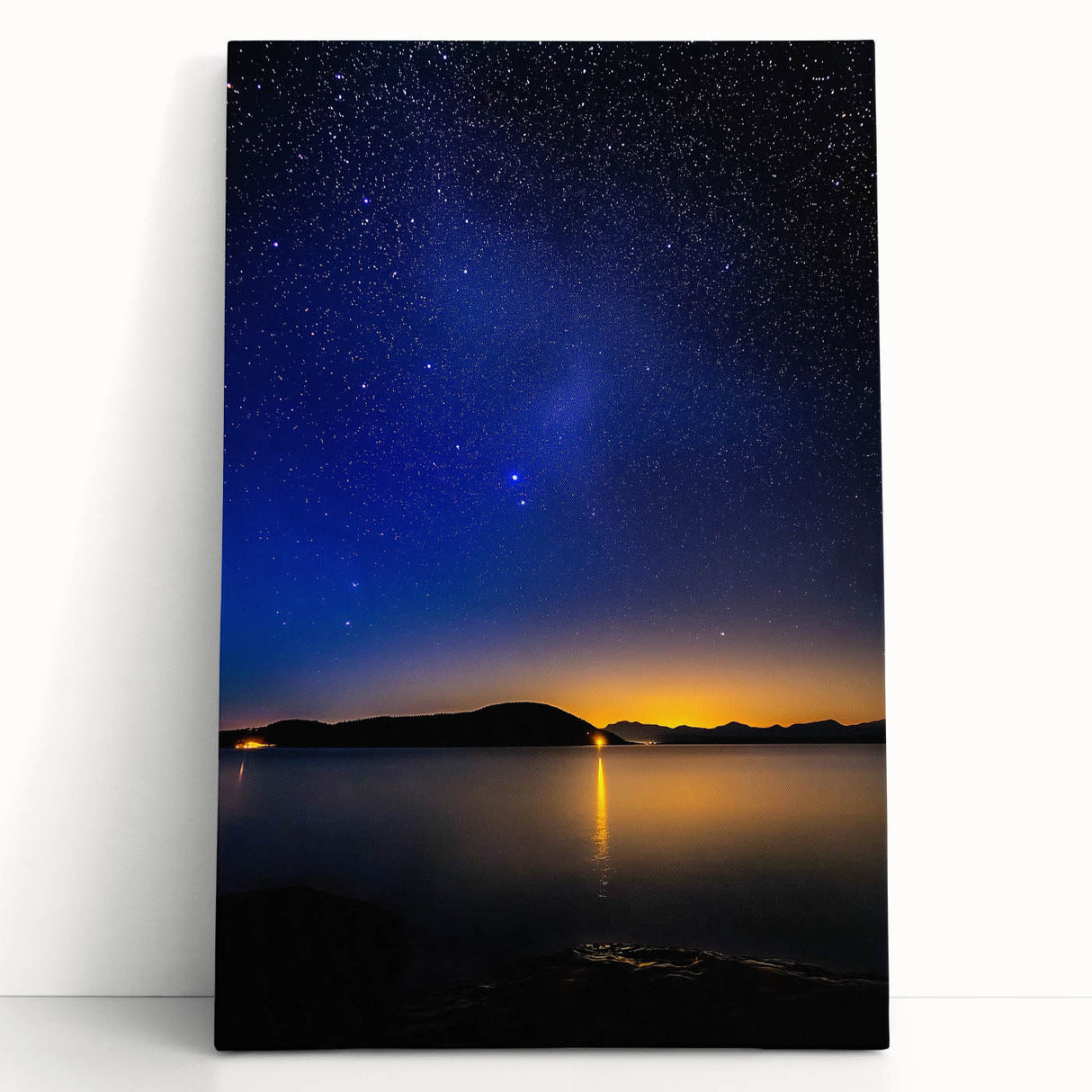 Stretched canvas artwork showcasing a vibrant landscape design, leaning against a wall, perfect for home decor, emphasizing colorful details and artistic texture.