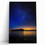 Stretched canvas artwork showcasing a vibrant landscape design, leaning against a wall, perfect for home decor, emphasizing colorful details and artistic texture.