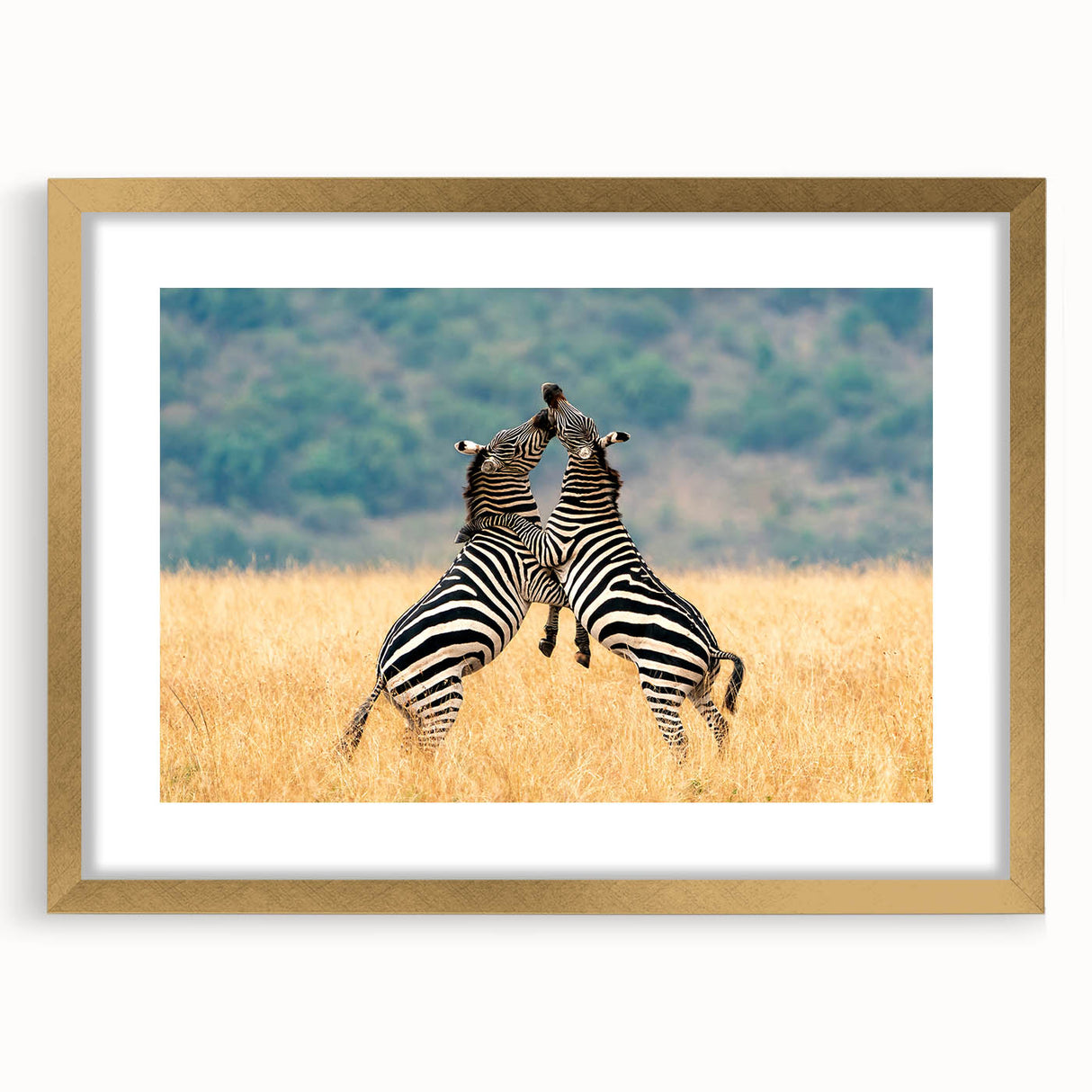 Textured abstract art print of African scenery in muted earth tones, framed in gold, ideal for bedroom art.