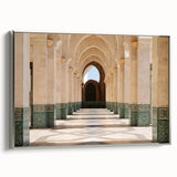 Vintage poster art of a Moroccan landscape on a framed canvas.