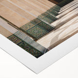 Art deco poster featuring a Moroccan landscape in earthy tones on a rolled canvas, suitable for dining room decor.