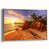 Framed canvas landscape art depicting the Seychelles with vibrant blue ocean and lush greenery, ideal for living room decor.