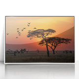 Acrylic print of Tanzanian scenery in muted earth tones, framed in white, suitable for nursery wall art.