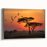 Framed canvas of a Tanzanian landscape featuring vibrant colors and vintage poster style.