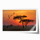 Extra large rolled print of a Tanzanian landscape featuring acacia trees and sunset colors, ideal for dining room wall art.