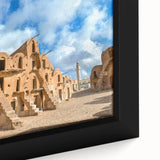 Extra large framed canvas featuring a textured, colorful depiction of a Tunisian landscape, ideal for living room decor.