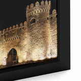 Framed canvas featuring a textured, colorful abstract design with black elements.