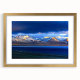 Extra large wall art featuring an abstract depiction of a Tibetan landscape in textured gold and earth tones.