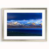 Abstract textured art print depicting a serene Tibetan landscape in muted earth tones, framed in silver.