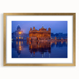Extra large abstract art print depicting a textured Indian scenery in gold and earth tones, framed with mat.