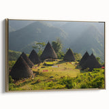 Framed canvas featuring a vintage-style Indonesian landscape in muted gold and black tones, ideal for bedroom wall decor.