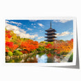 Rolled print of Kyoto scenery with pink cherry blossoms and a temple, in soft pastel shades, ideal for art wall dining room.