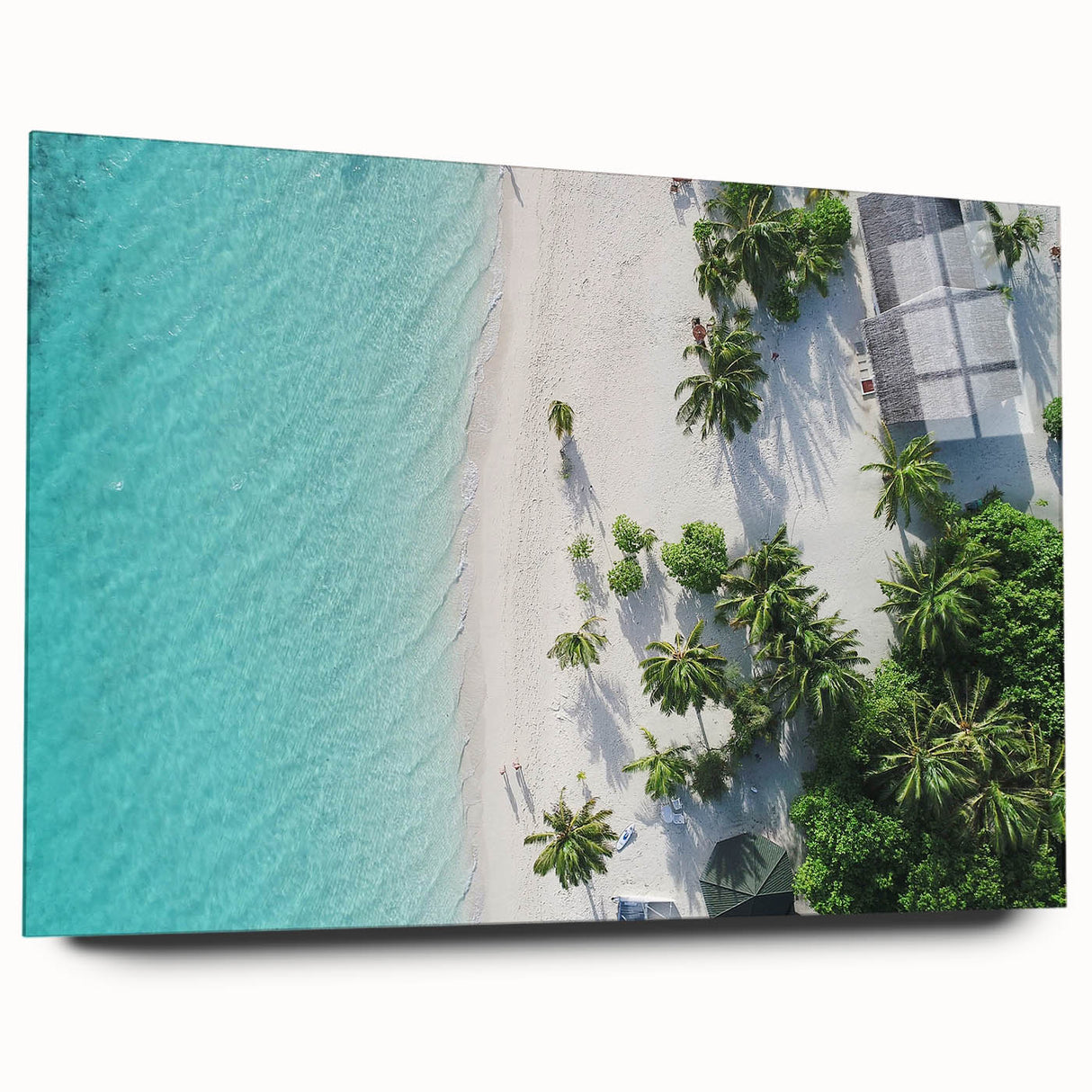 Large abstract wall art of the Maldives in muted blue and green tones on acrylic glass.