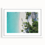 Abstract art print of Maldivian scenery in muted blue and green tones, framed with a white mat.