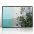 Large abstract wall art depicting the Maldives seascape in vibrant blues and greens on a black framed acrylic.