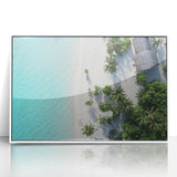 Acrylic print of a serene Maldivian landscape in pastel blues and greens, framed in white.