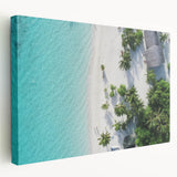Large art print on stretched canvas depicting a tranquil Maldives beach scene, with soft blue and turquoise tones.