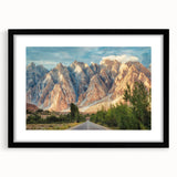 Extra large abstract art print depicting a vibrant, colorful scenery of Pakistan, textured and framed in black.