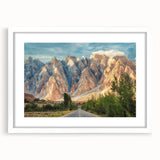 Abstract art print of a serene Pakistani landscape in soft earth tones on a white framed canvas.
