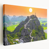 Side view of a stretched canvas depicting a Vietnamese landscape in muted green and blue tones, ideal for kitchen wall art.