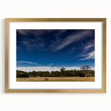 Textured abstract art print of Adelaide scenery in muted earth tones on a framed canvas, suitable for bedroom decor.