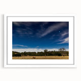 Textured abstract art print of Adelaide scenery in muted earth tones on a large framed canvas, ideal for living room decor.
