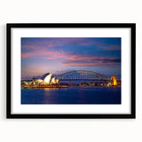 Extra large abstract art print of Sydney scenery in vibrant, colorful hues on a black framed canvas.