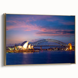Framed canvas wall art depicting the Sydney skyline in muted gold tones, suitable for bedroom decor.