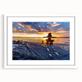 Abstract art print of a Manitoba scenery in muted earth tones on a framed white mat, suitable for dining room decor.