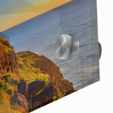 Large abstract wall art depicting a Newfoundland coastline in muted gray and blue tones on acrylic glass.