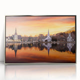 Mid-century modernist art depicting Nova Scotia scenery in cool blue tones, framed in silver acrylic.