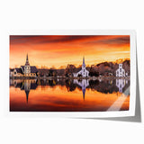 Rolled print of Nova Scotia scenery with vibrant green and blue tones.