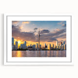 Abstract art print of Ontario scenery in muted blue and green tones on a framed white canvas, ideal for dining room decor.