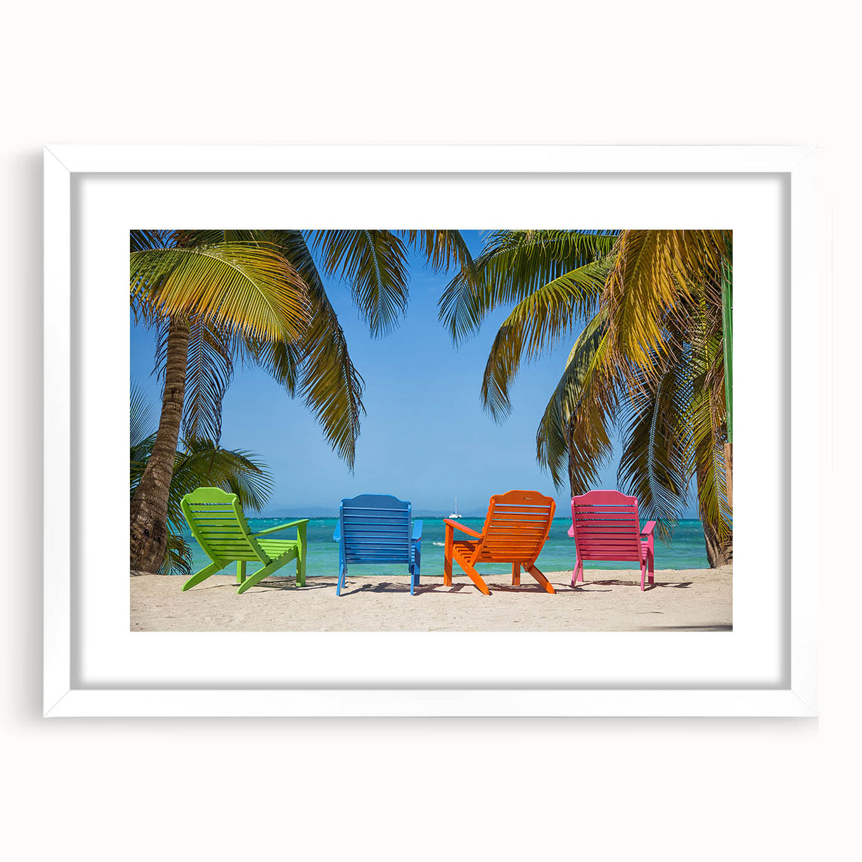Abstract art print of a Caribbean scenery in muted blue and green tones, framed with a white mat.