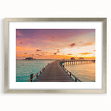 Extra large abstract art print of Caribbean scenery in textured silver frame, vibrant blue and green tones.