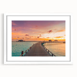 Textured art of abstract Caribbean scenery in muted blue and green tones, framed with a white mat.