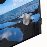 Large abstract wall art depicting a Caribbean seascape in vibrant blue tones on acrylic glass, ideal for dining room art.