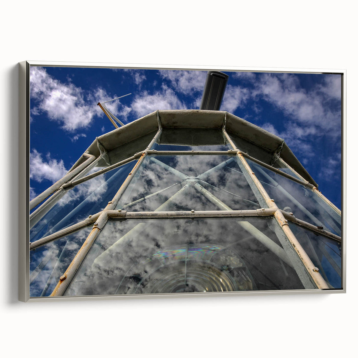 Framed canvas featuring a vintage-style Caribbean landscape with vibrant blue and green tones.
