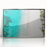 Art deco poster depicting Caribbean scenery with vibrant blue and green tones on a framed acrylic.