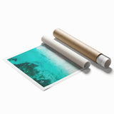 Extra large rolled print depicting a serene Caribbean scenery with vibrant blue and green floral accents.