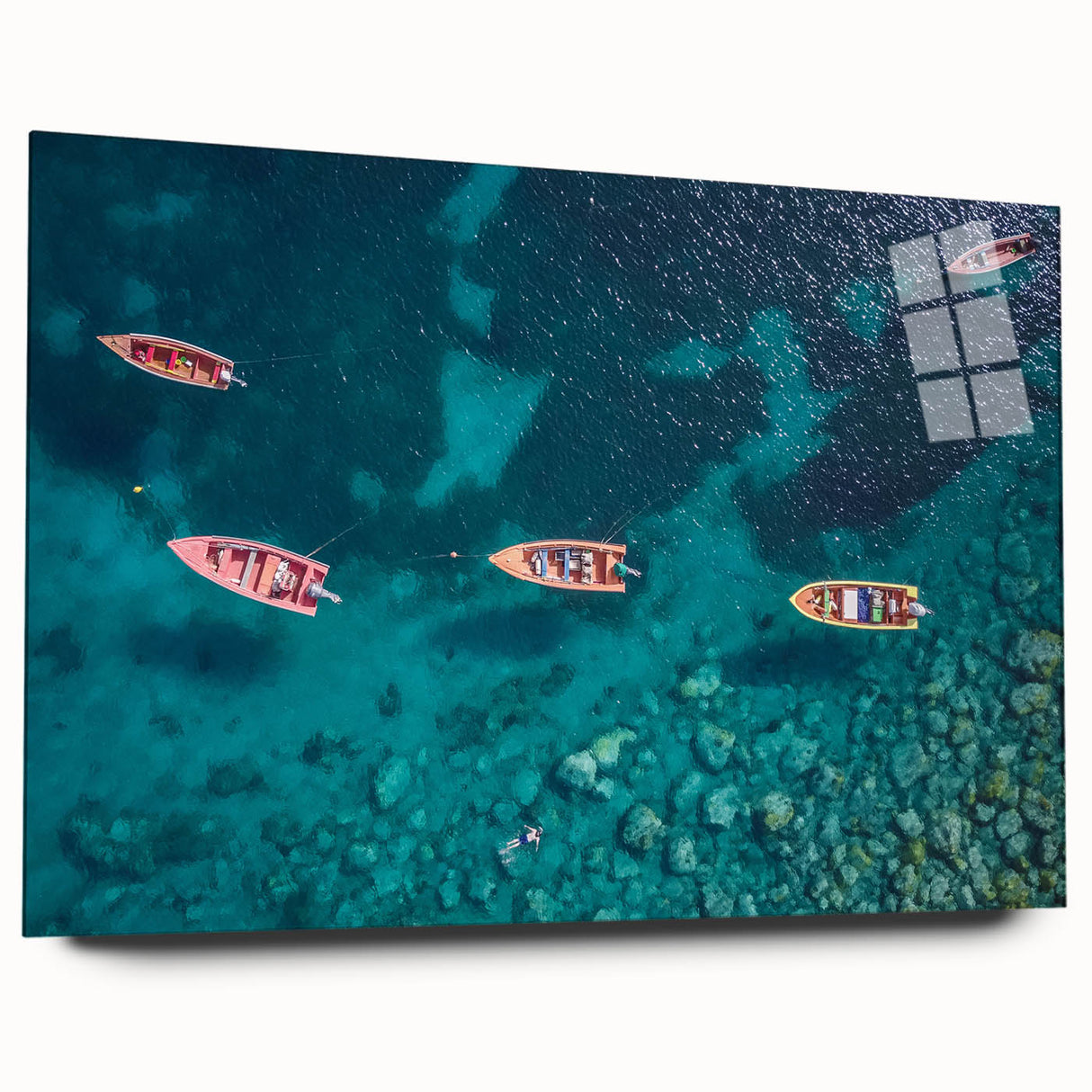 Large abstract wall art depicting a Caribbean seascape in vibrant blues and greens on acrylic glass.