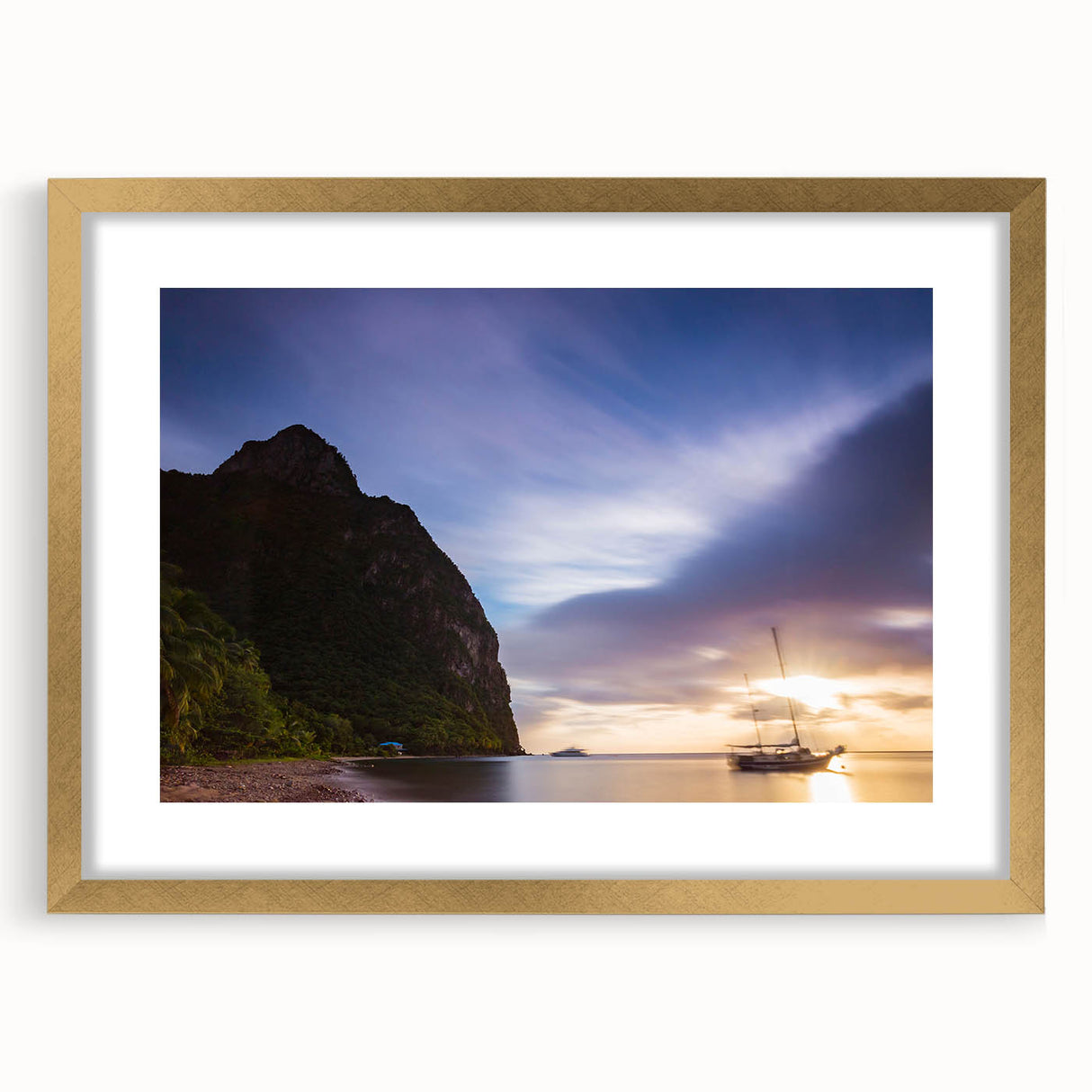 Extra large wall art of an abstract Caribbean scenery in textured tones of blue and green, framed in gold.