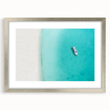 Extra large abstract art print featuring textured waves in turquoise and white, framed in silver.